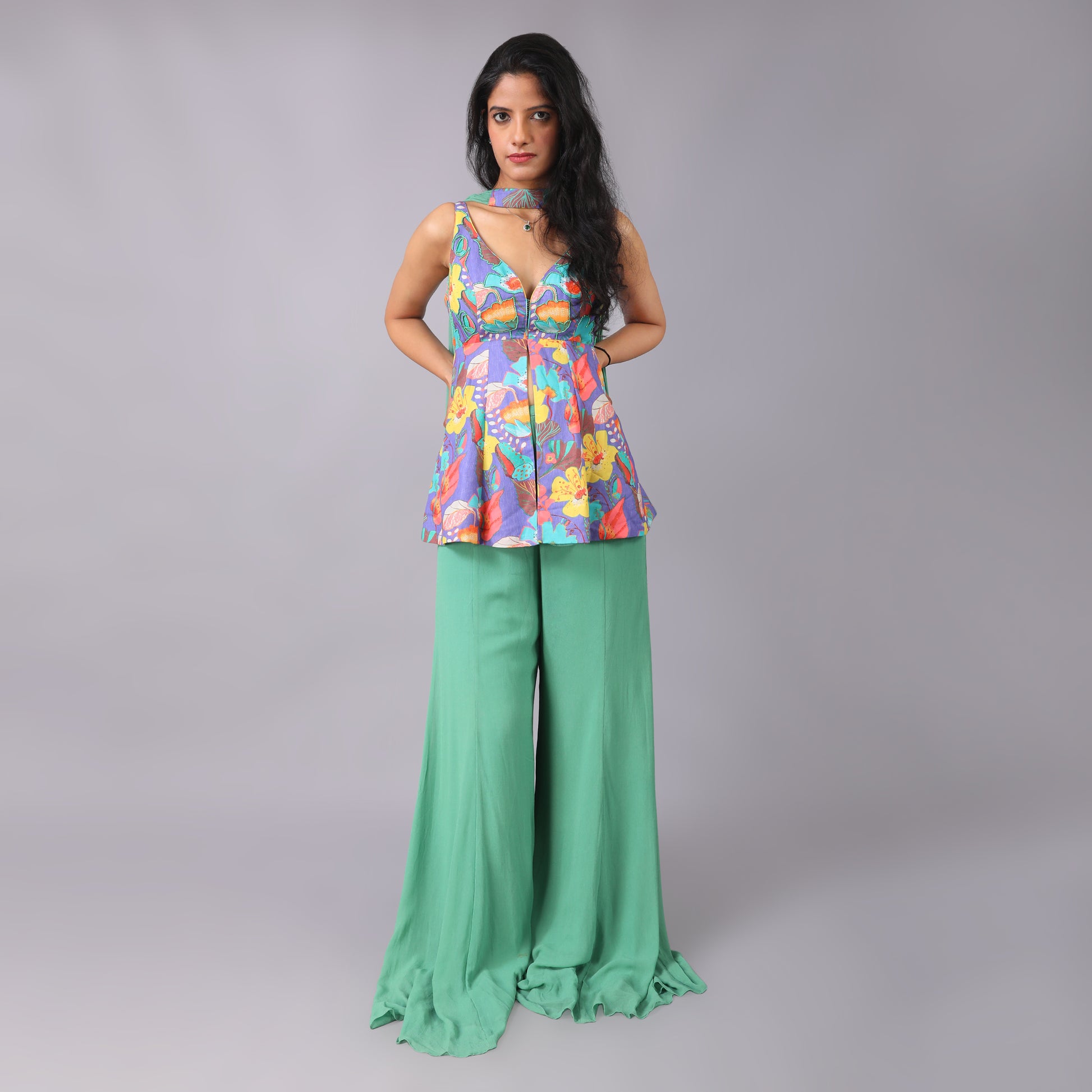 Vibrant Multicolored Peplum Top with Flowy Green Sharara Pants and Dupatta