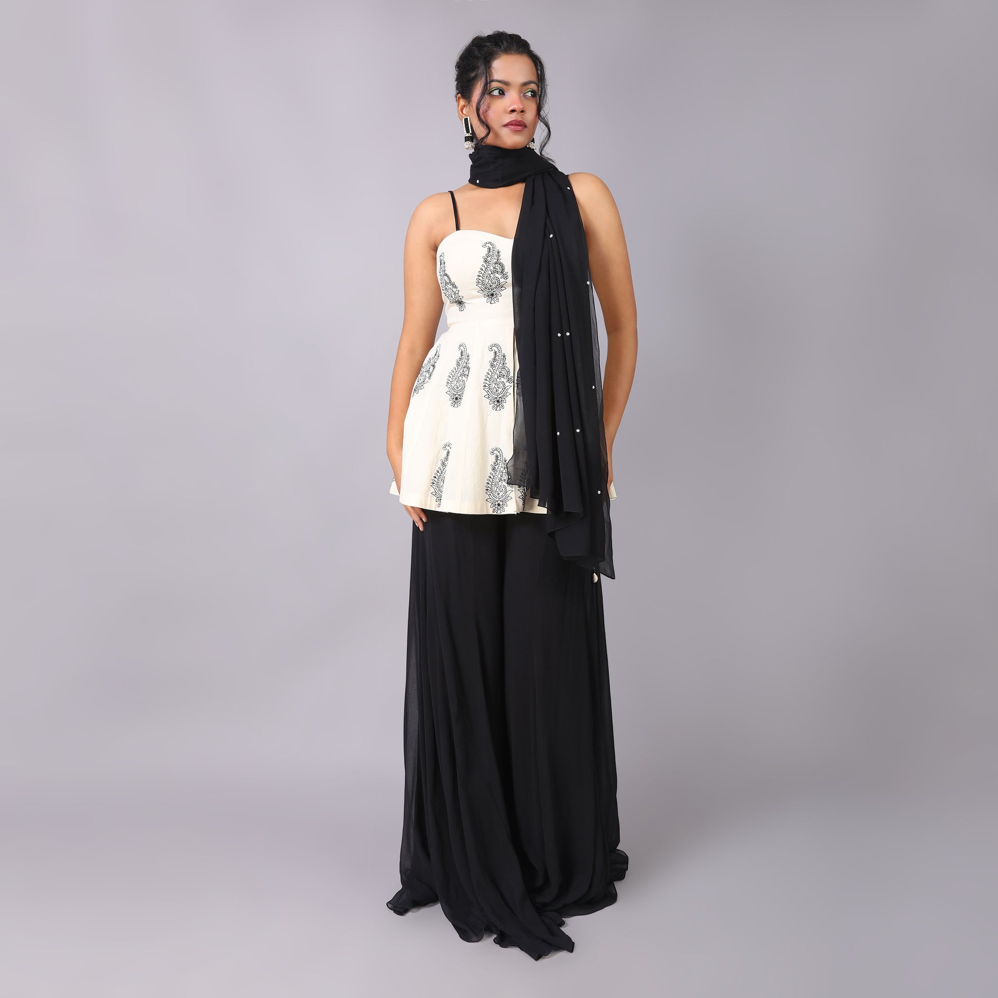 Ivory Peplum With Black Georgette Sharara and Beaded Dupatta