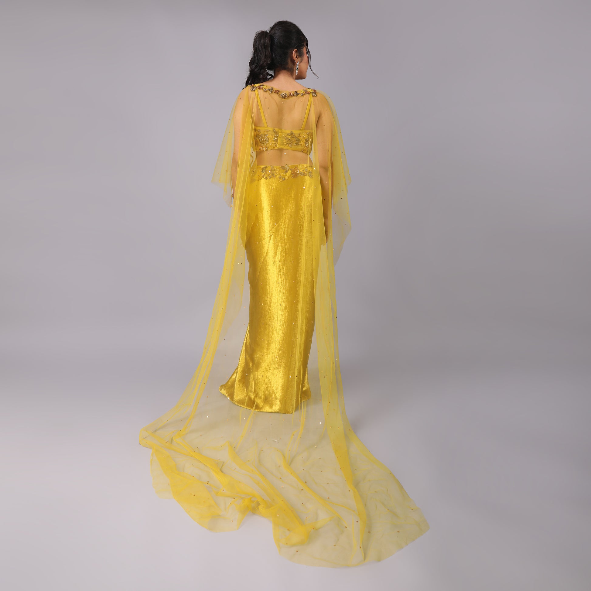 Golden Drape Skirt with Hand-Embroidered Blouse and Sheer Trailed Cape