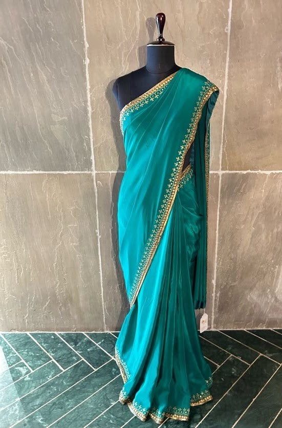 Emerald green crepe saree