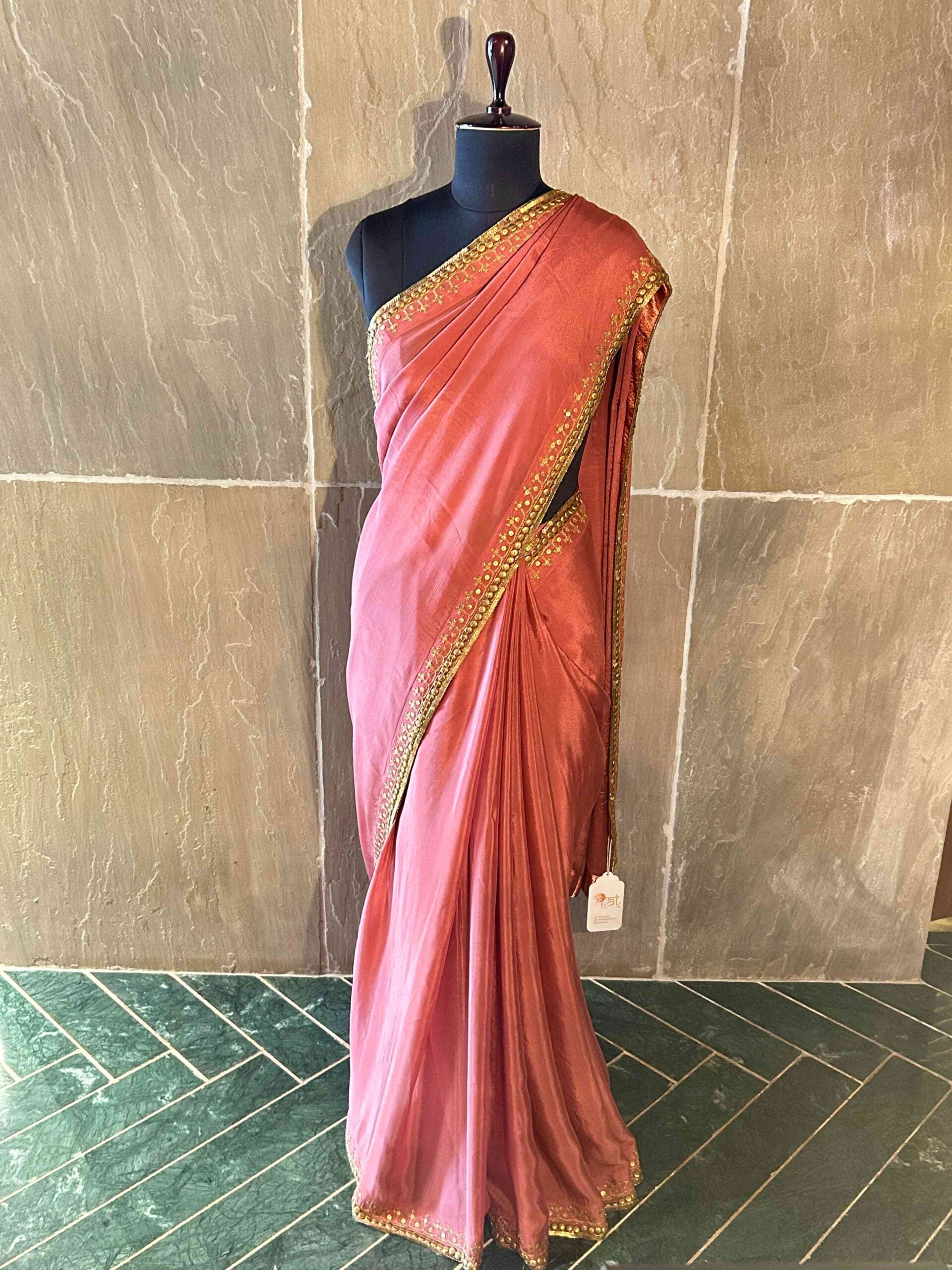 Onion pink satin saree with metal embellishments