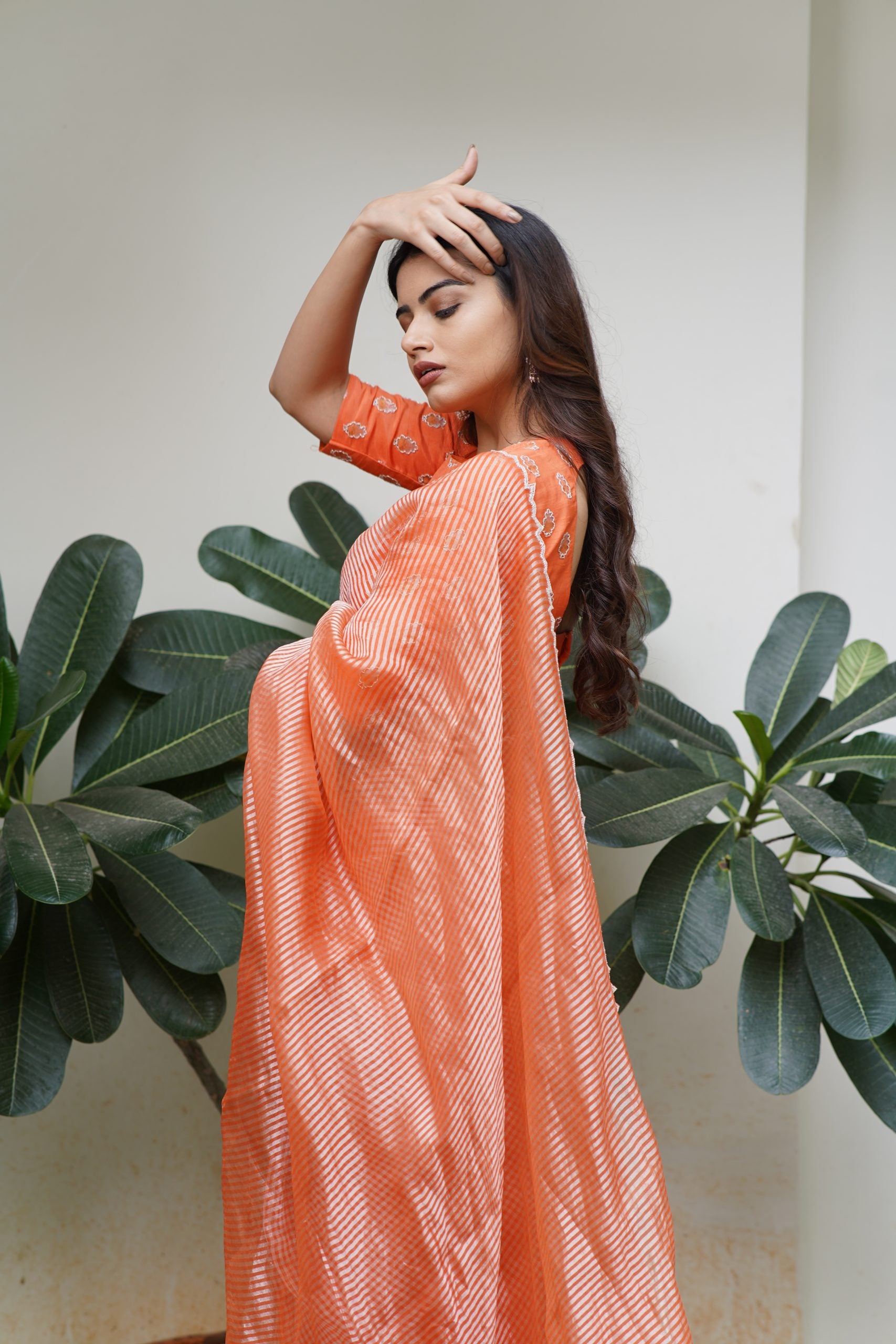 Orange Tissue Saree with Silver Zari