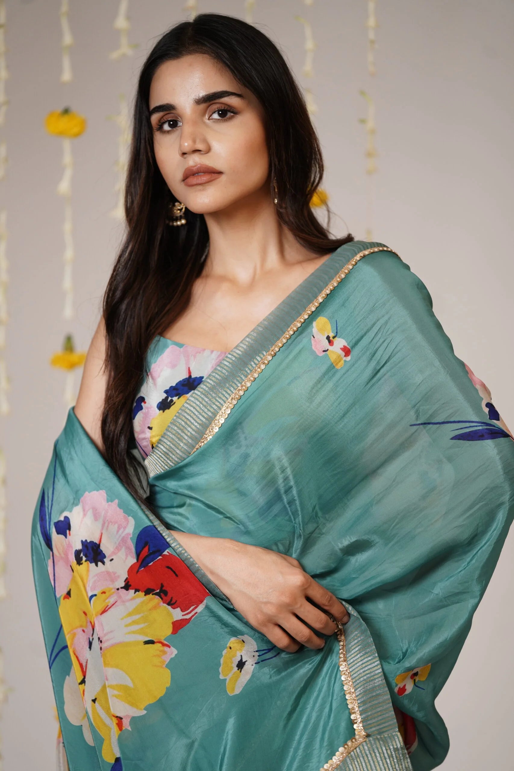 Mandhaara Nilavarna Floral Green Organza Saree