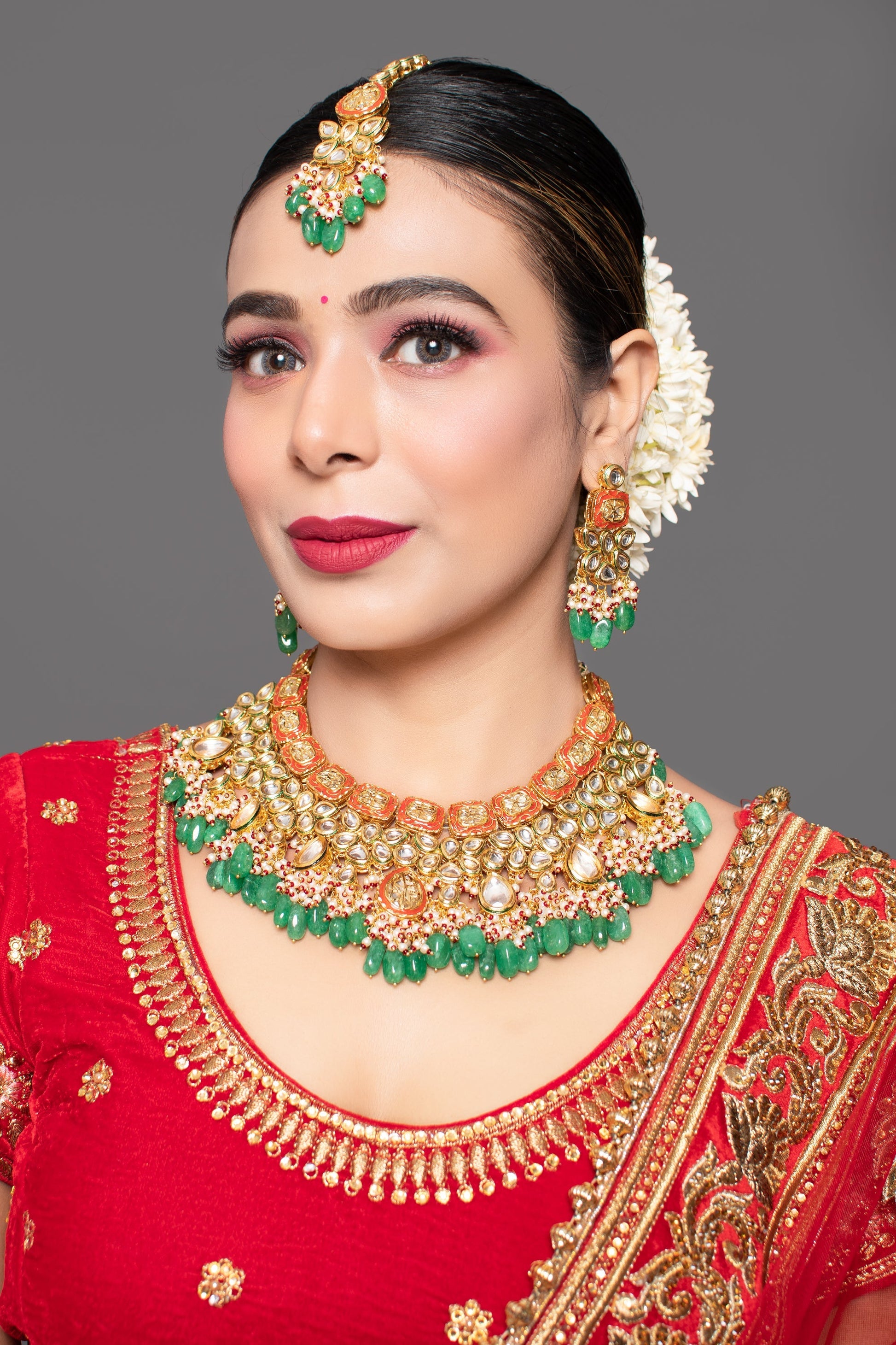 Green Red Gold toned Handcrafted Kundan necklace with matching earrings & Maang Tikka