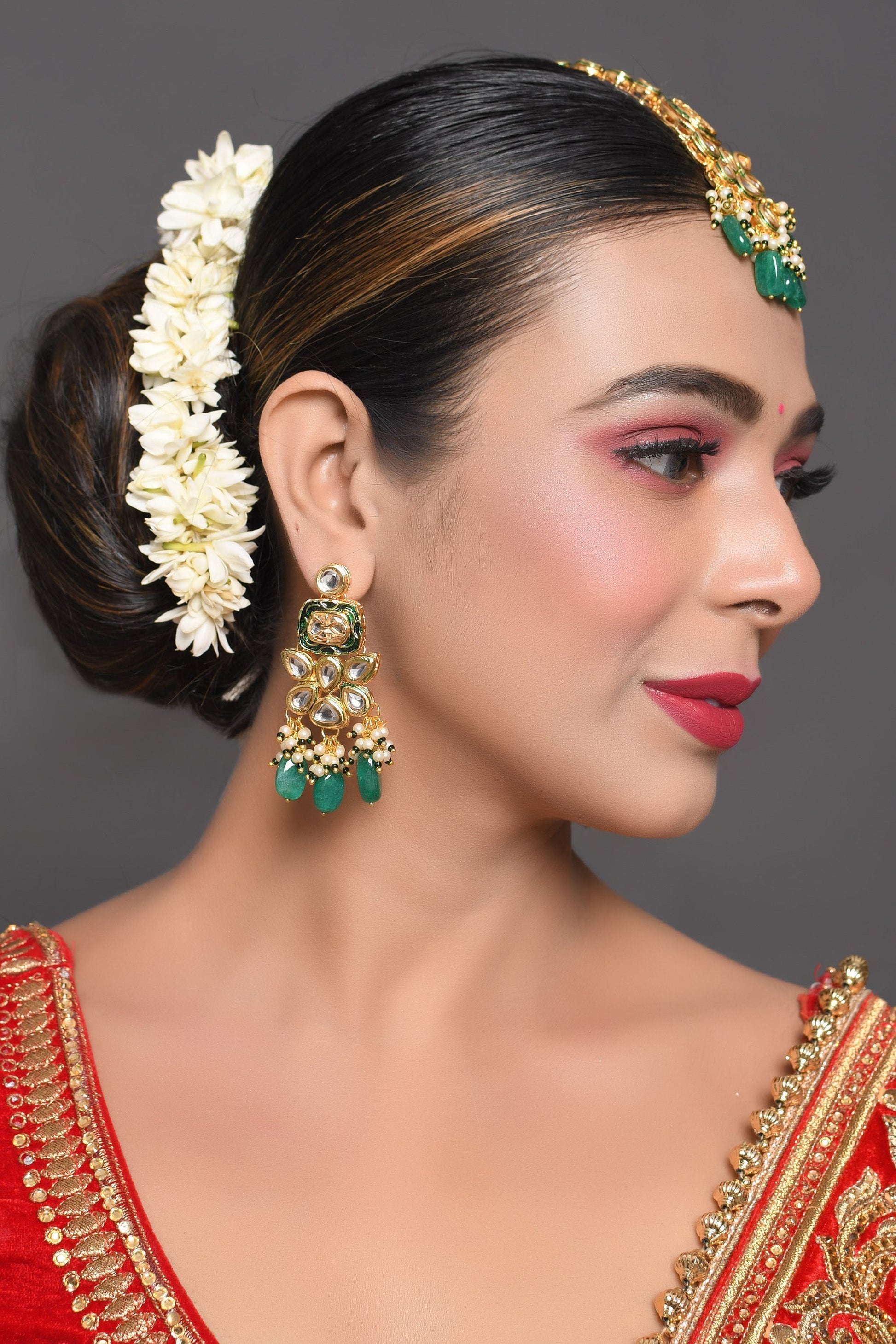 Green Gold toned Kundan earrings with Maang Tikka