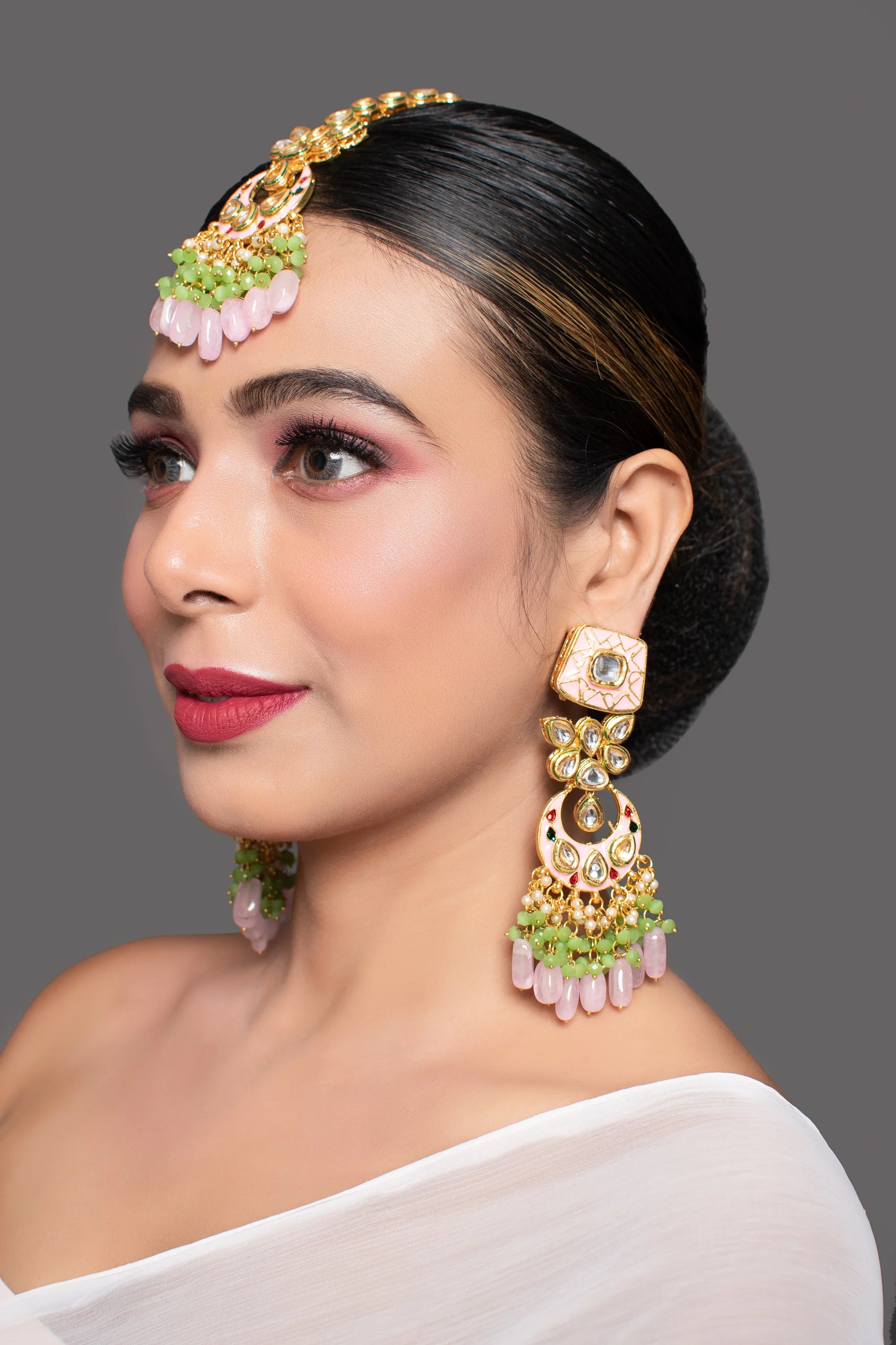 Handcrafted Kundan enameled Kundan earrings with Maang Tikka