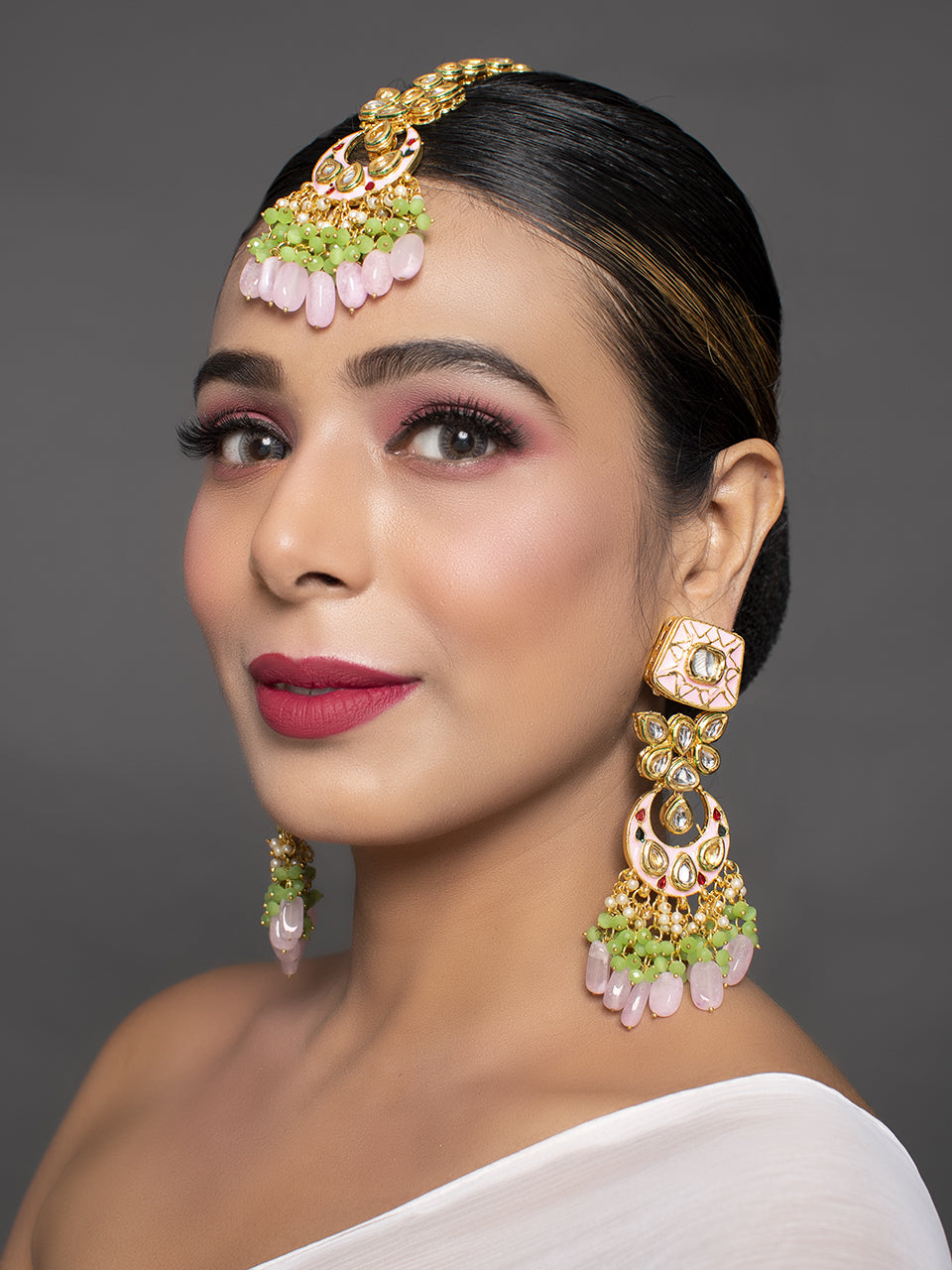 Handcrafted Kundan enameled Kundan earrings with Maang Tikka