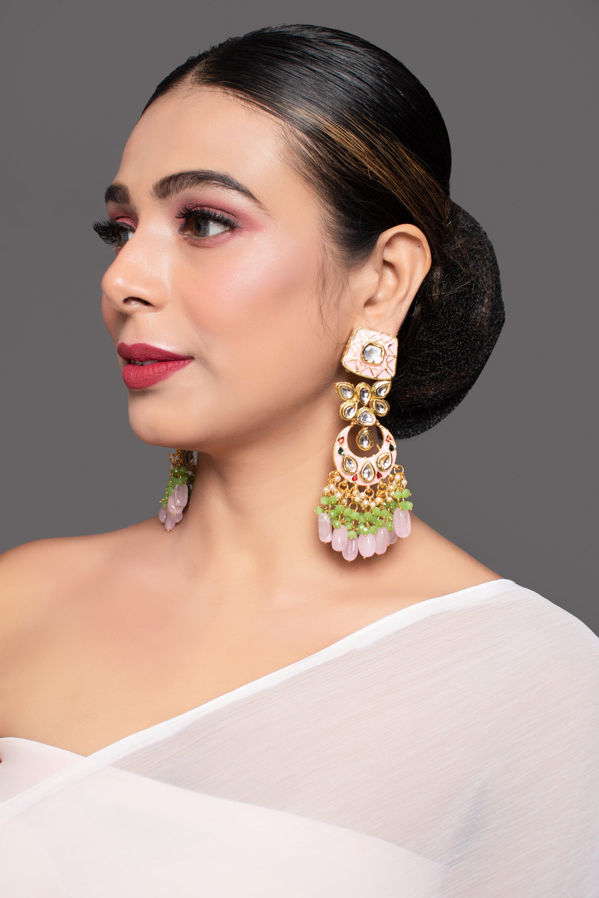 Gold toned Pink Green beaded Kundan studded & enamaled handcrafted earrings