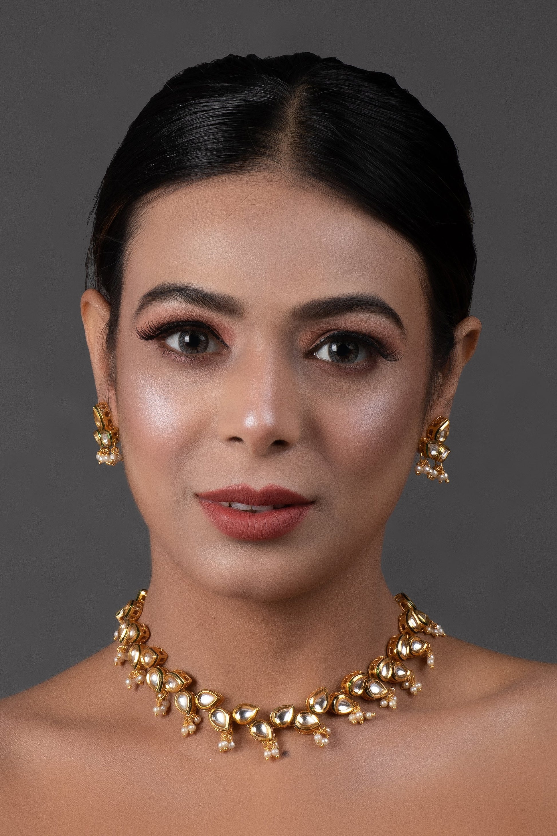 Elegant Tear drop shaped necklace with earrings