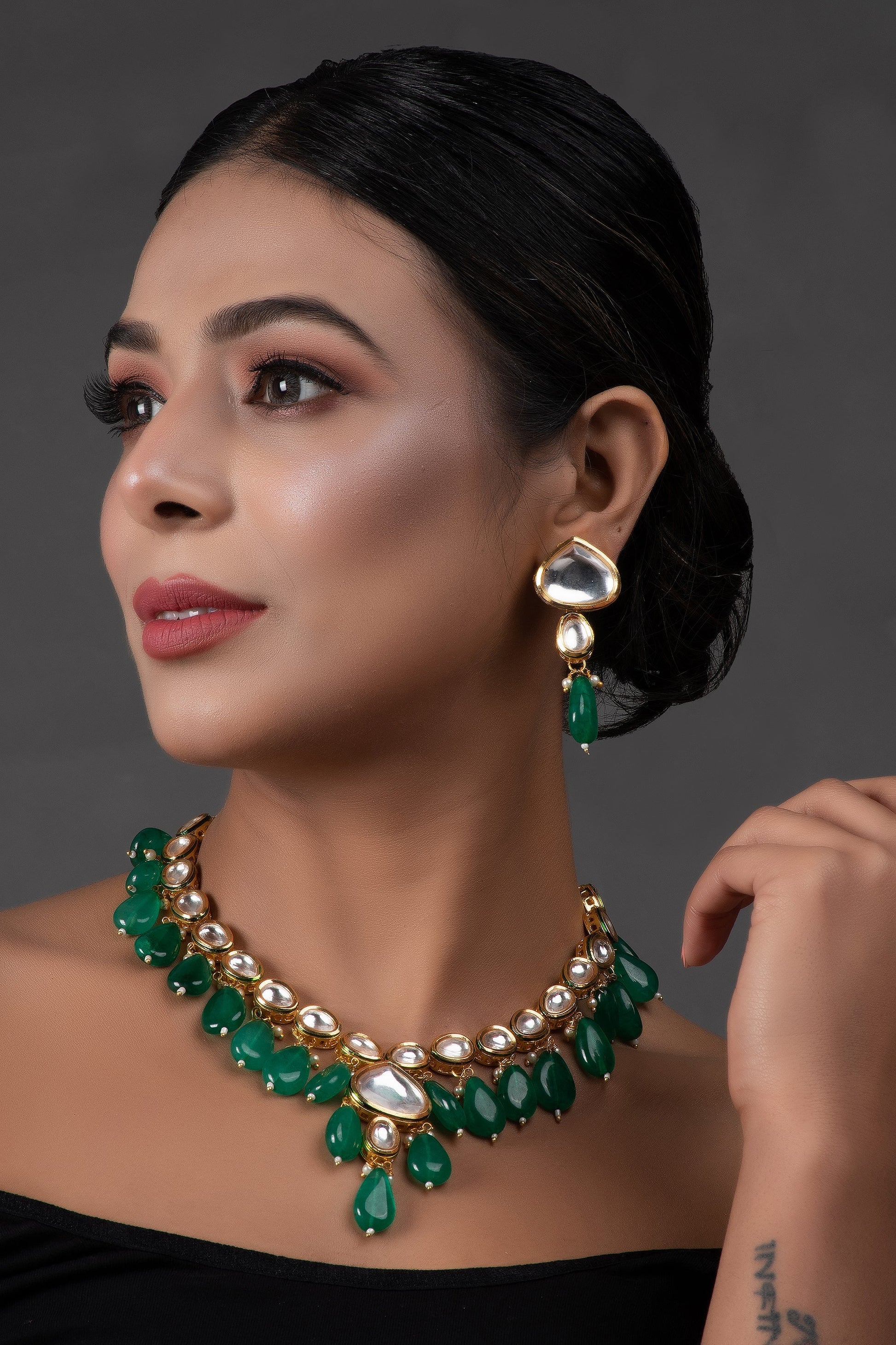 Emerald beaded Gold toned kundan inspired necklace with earrings