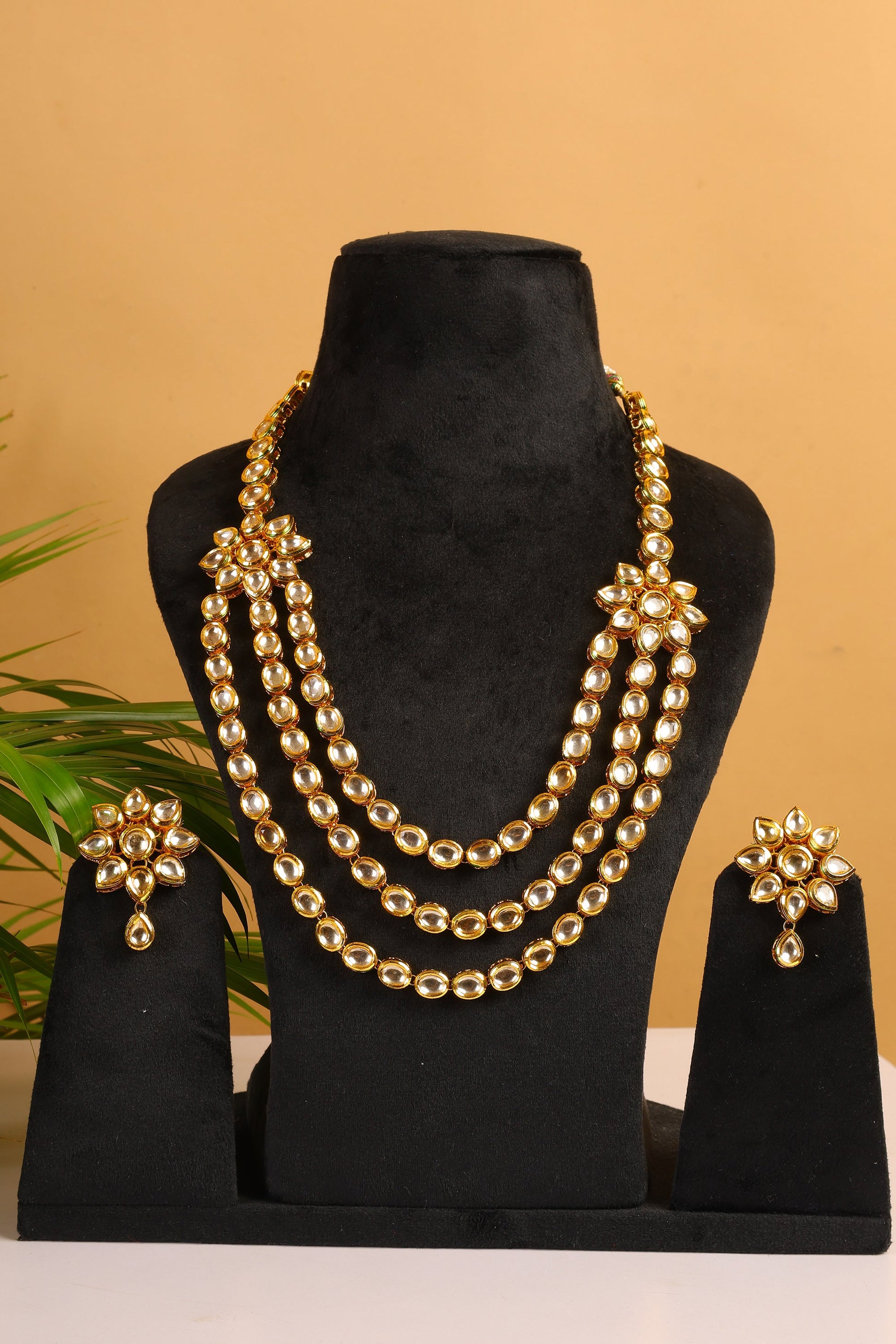 Two layered Kundan flower Embossed Necklace Set