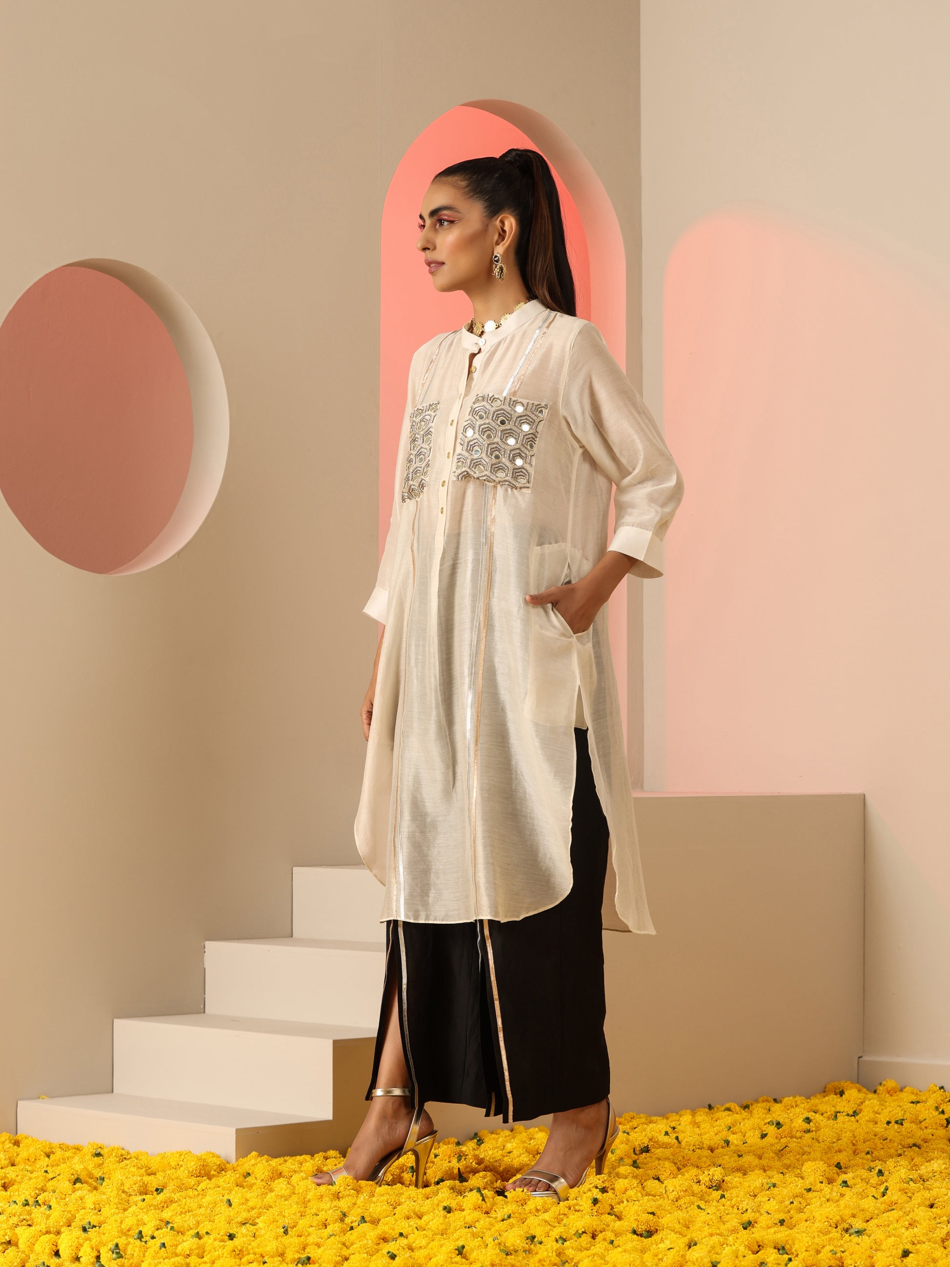 Ivory and black mirror and gota kurta set.