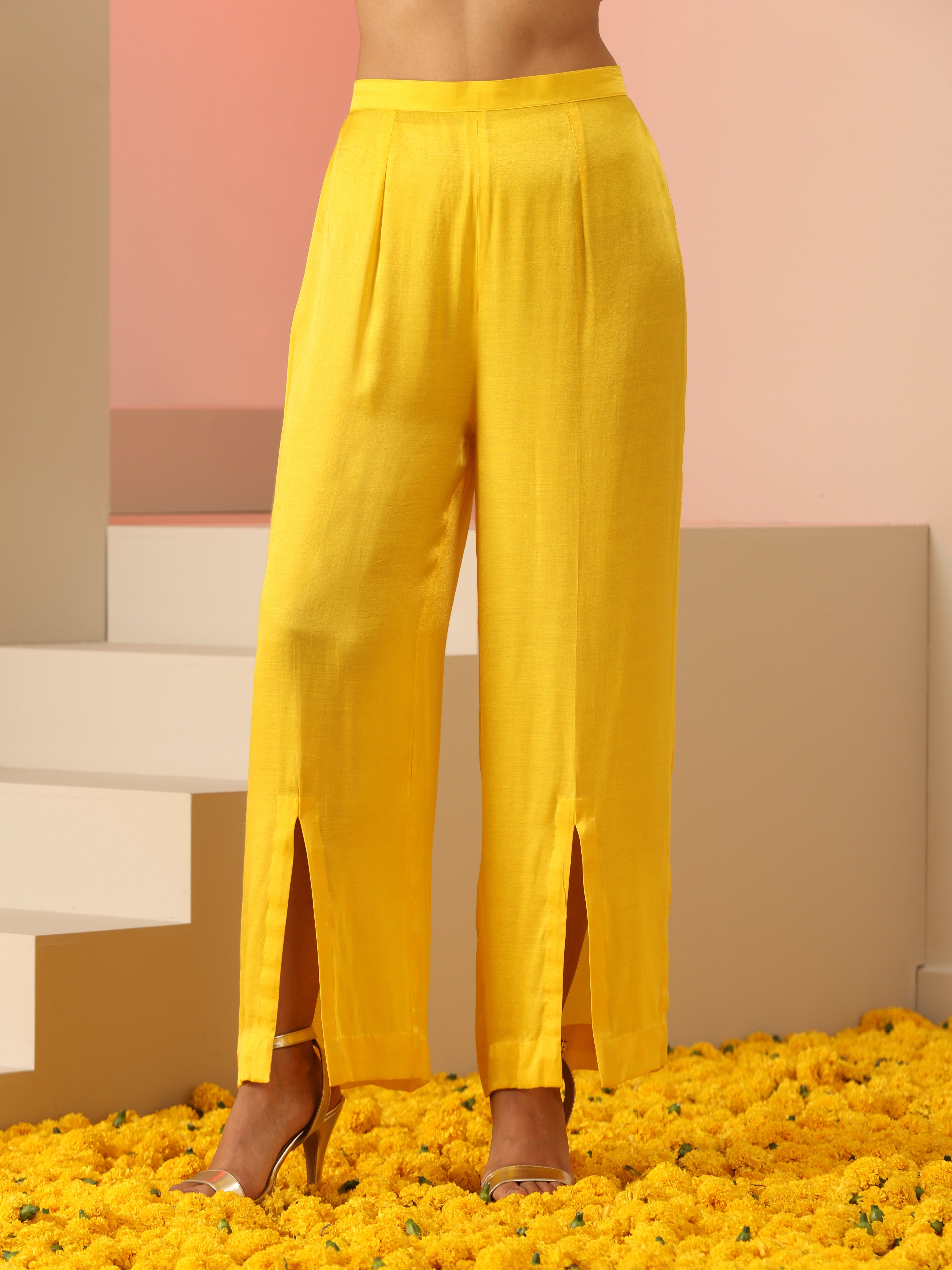 Yellow zardozi kaftan set with pants.