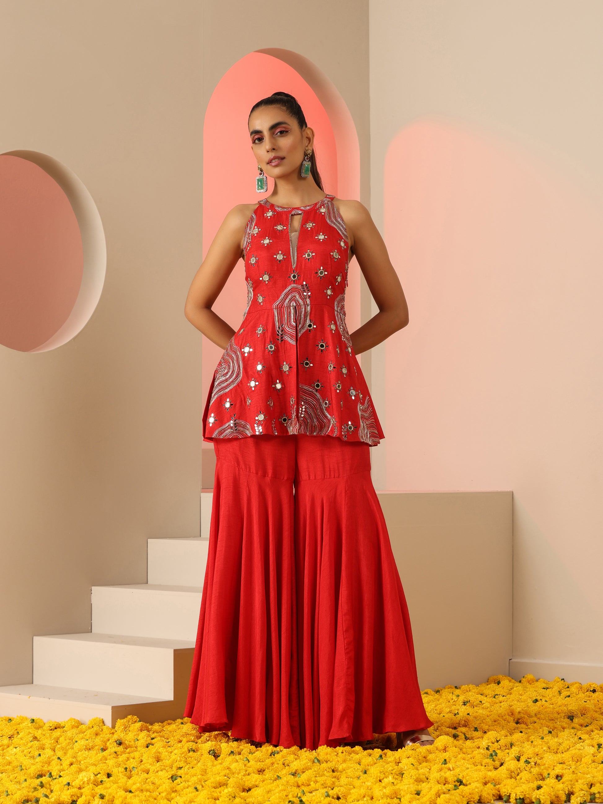 Red Zari and mirror work sharara set.