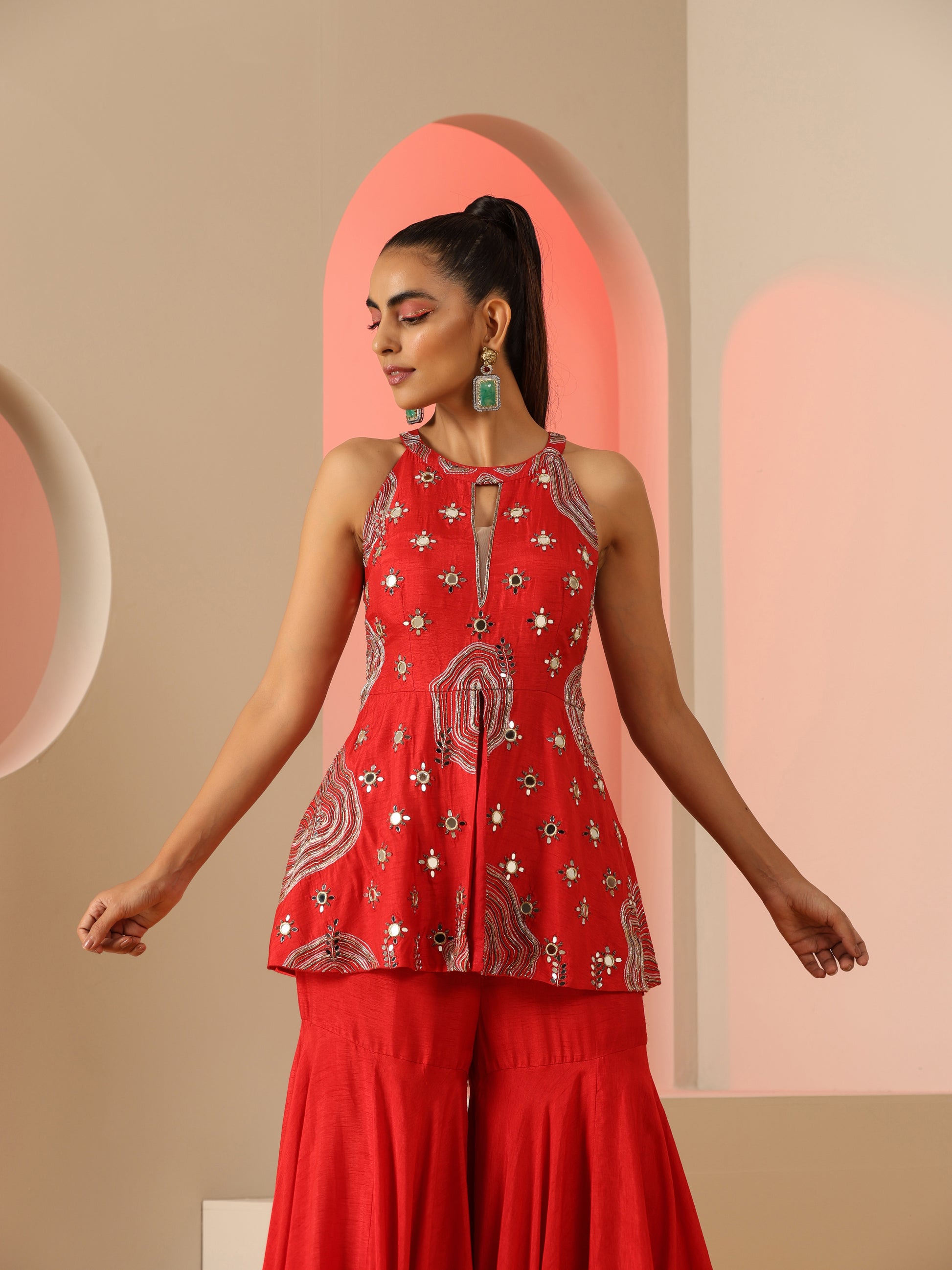 Red Zari and mirror work sharara set.