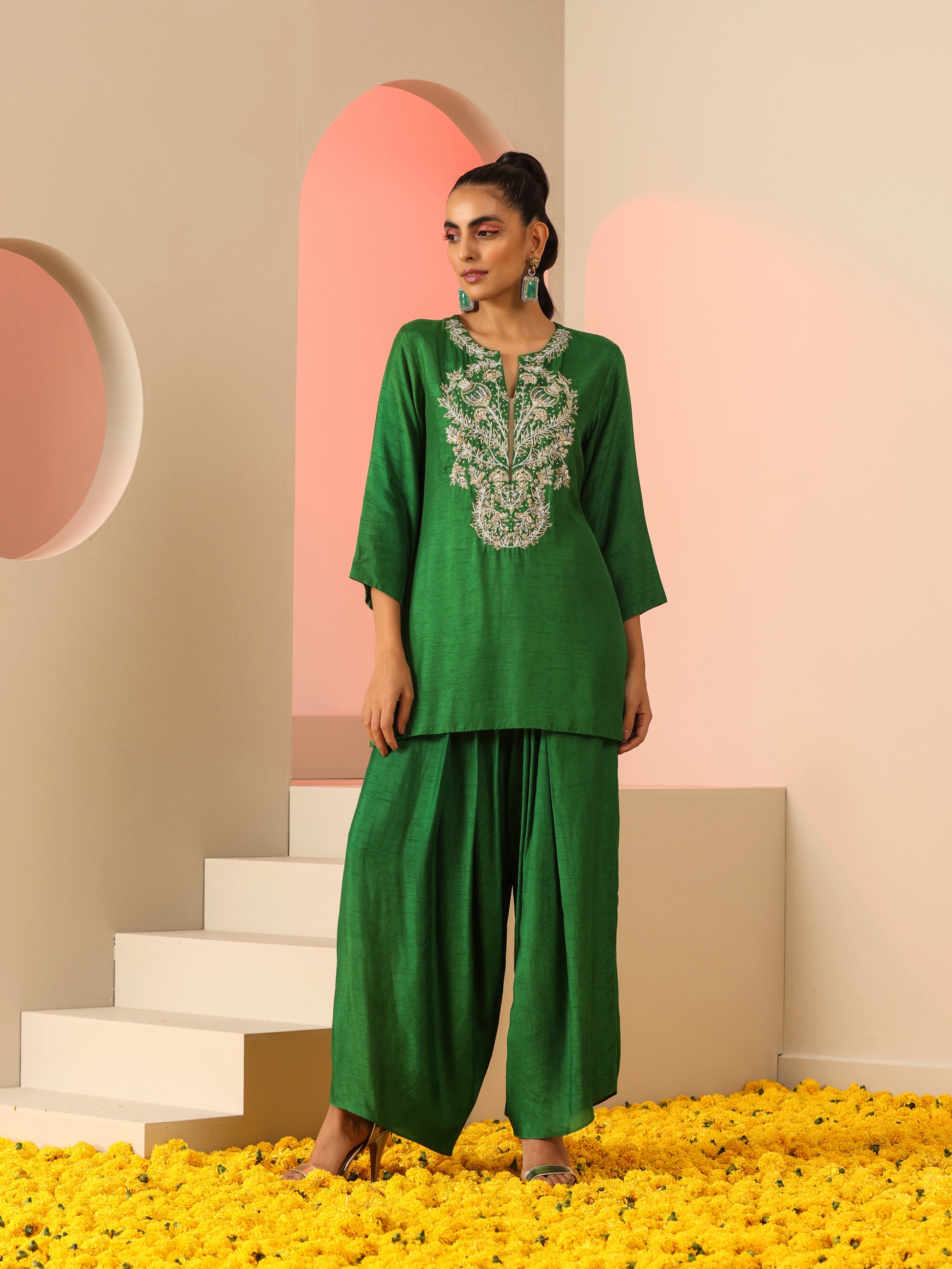 Green Zardozi neck kurta set.