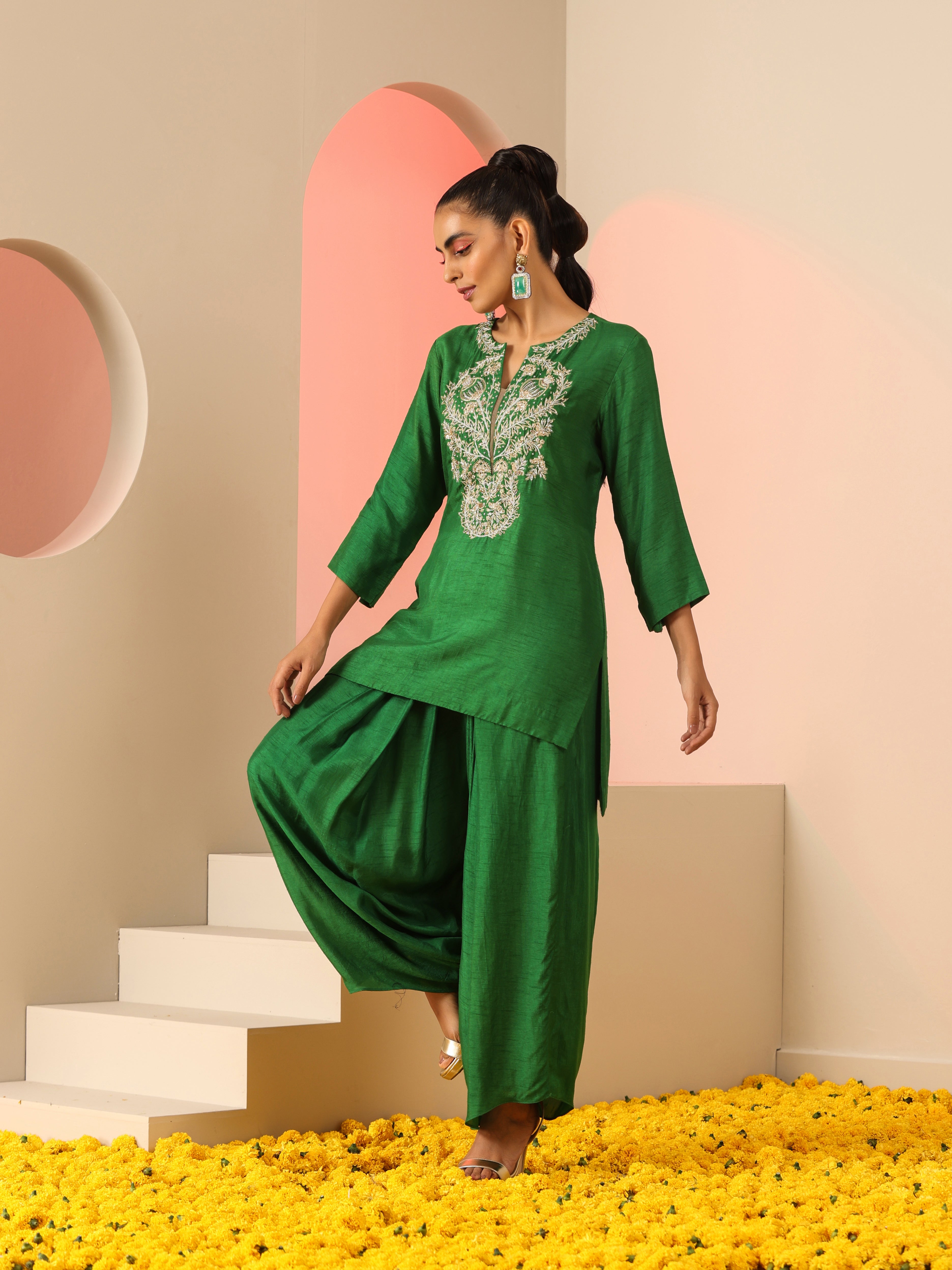 Green Zardozi neck kurta set.