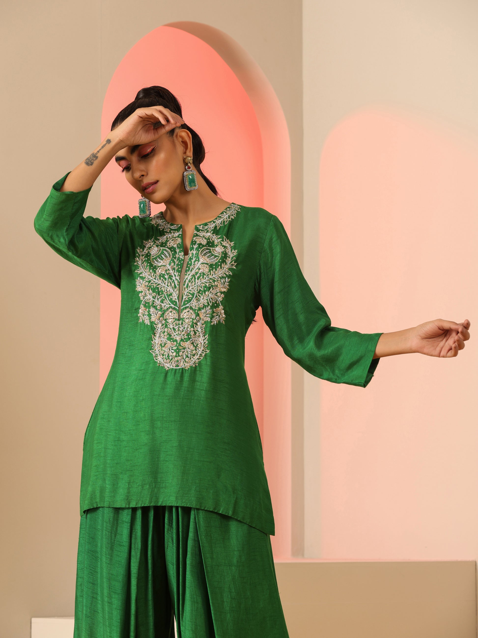 Green Zardozi neck kurta set.