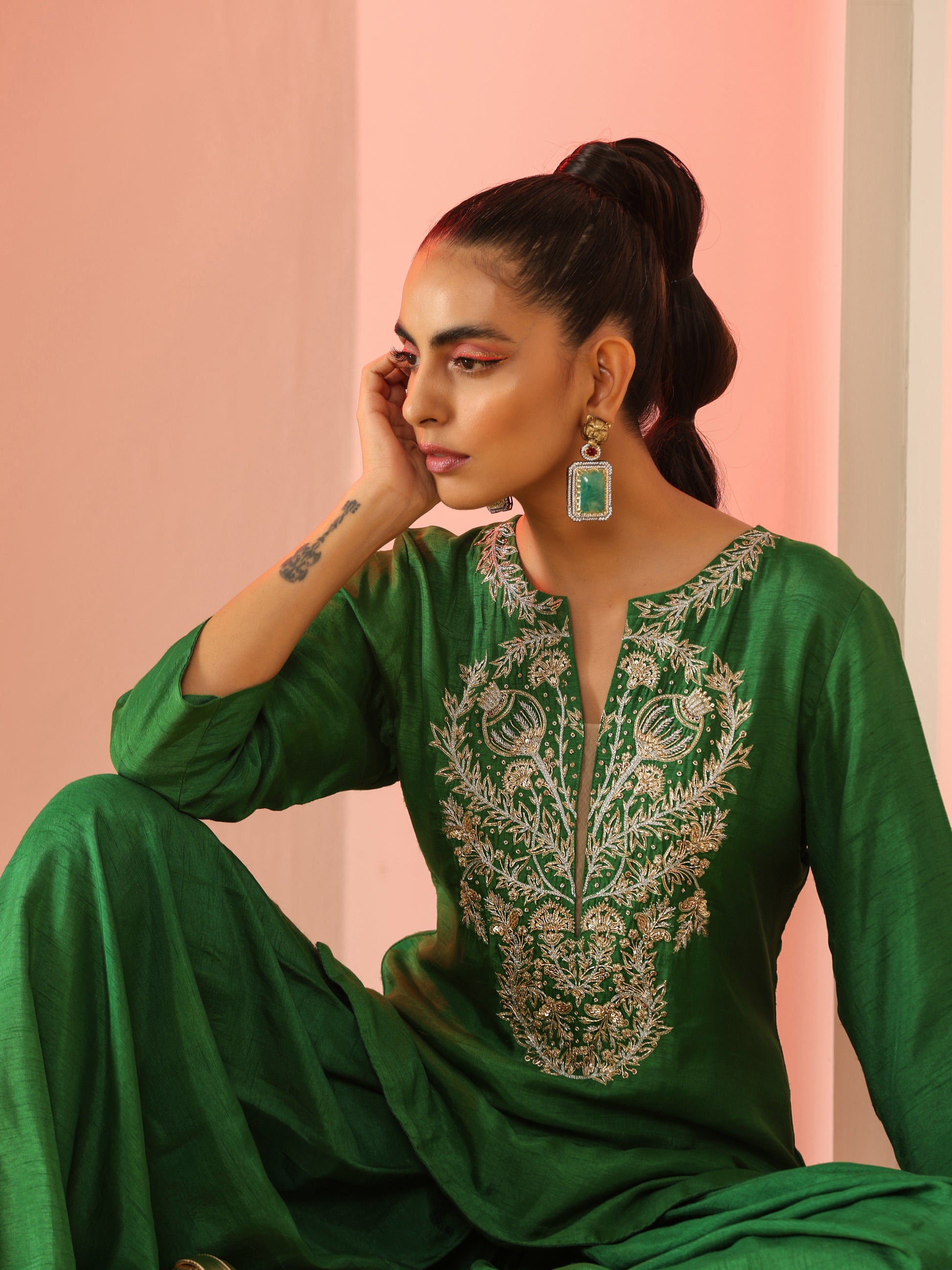 Green Zardozi neck kurta set.