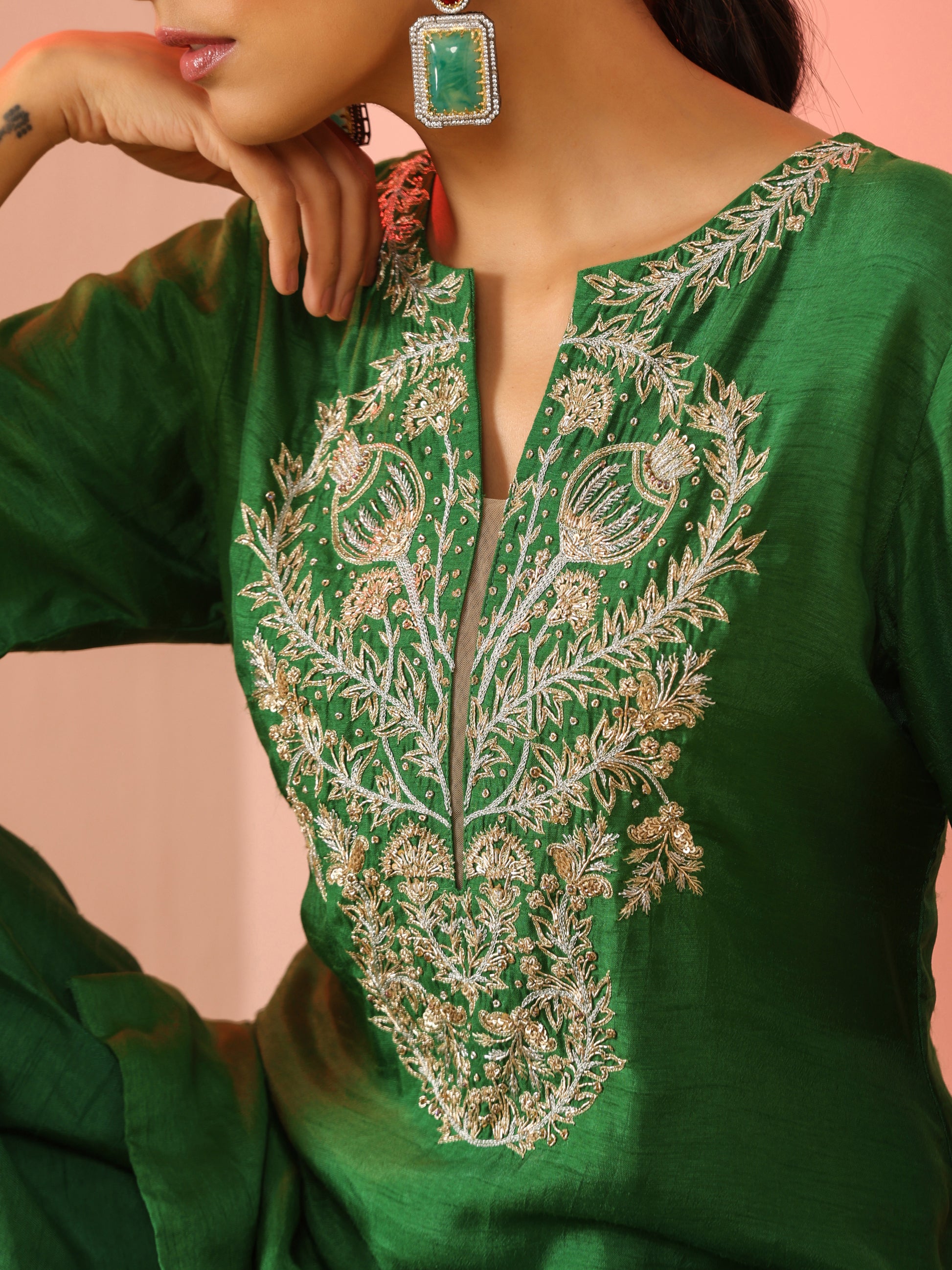 Green Zardozi neck kurta set.