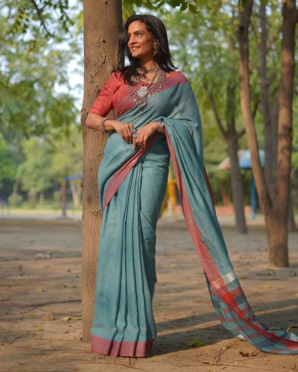 Esha green linen saree with unstitched blouse