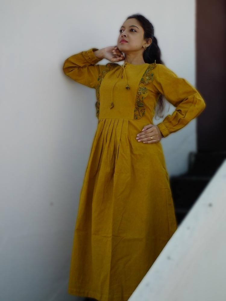 MYKONOS Smart fit,lantern Sleeves Chrome Yellow Cotton Ajrakh Printed Dress with round Stringed Neck, perfect for a beautiful vacation.