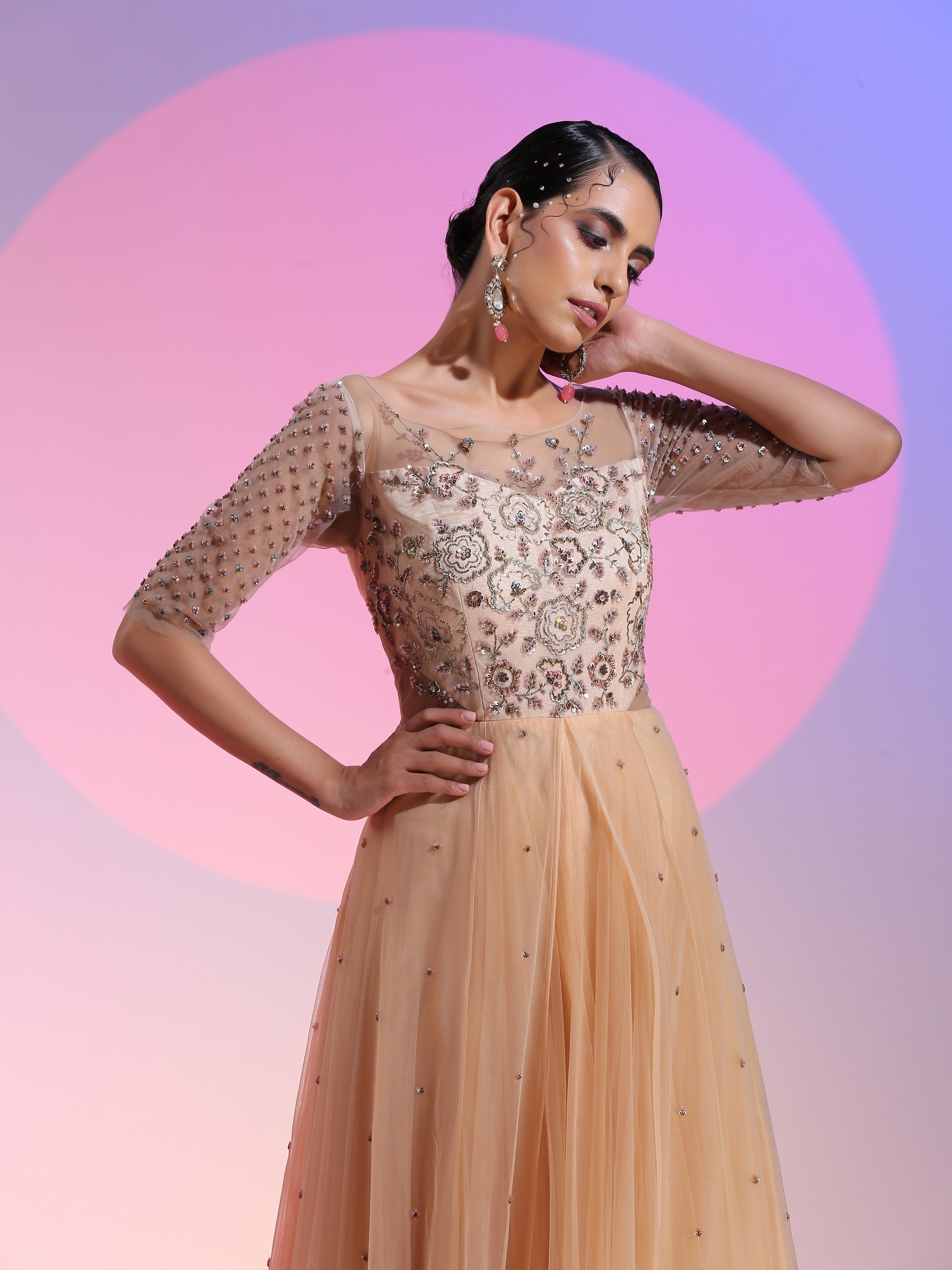 Sequin and beadwork layered net gown