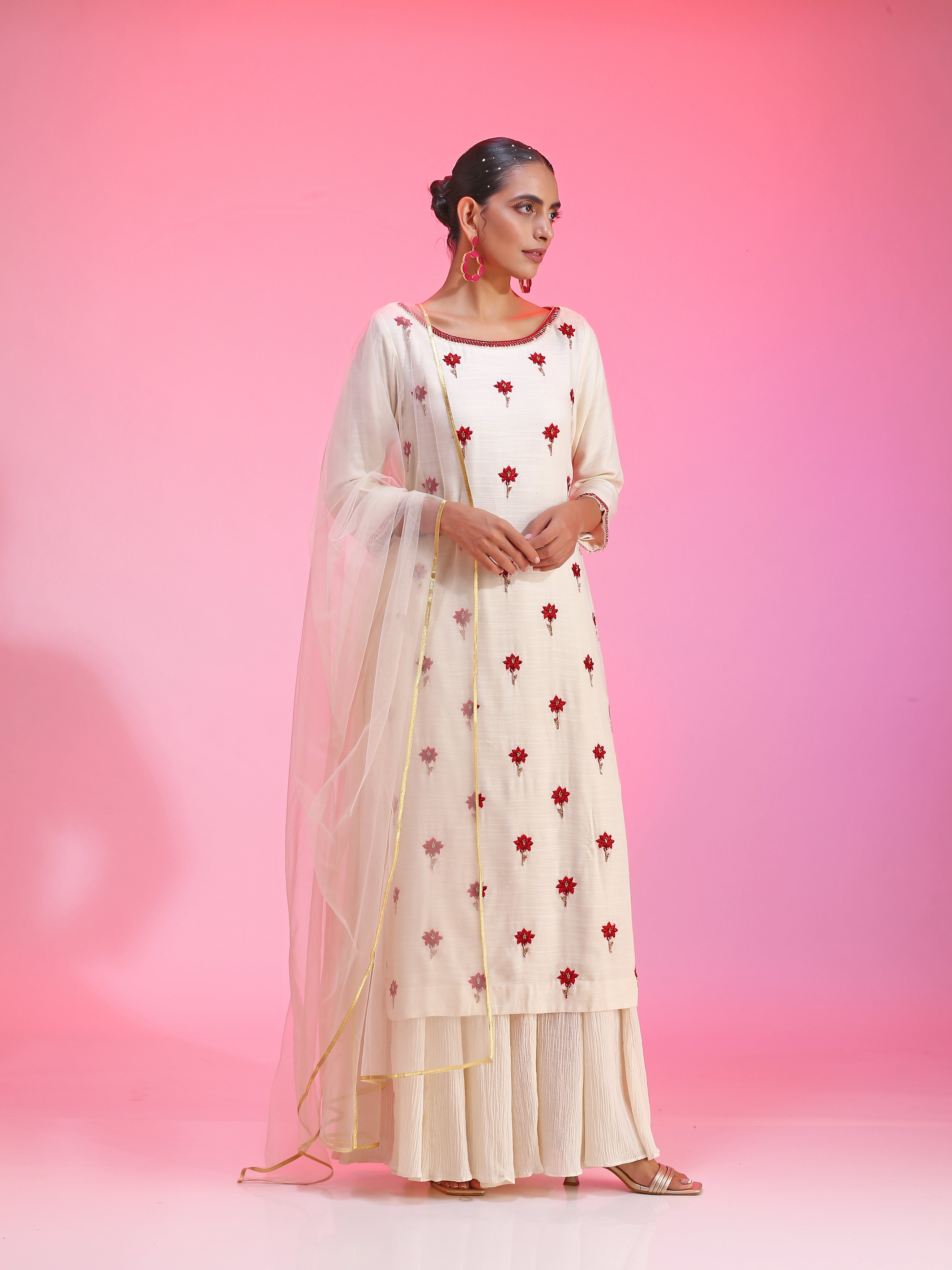 Resham work ivory kurta set